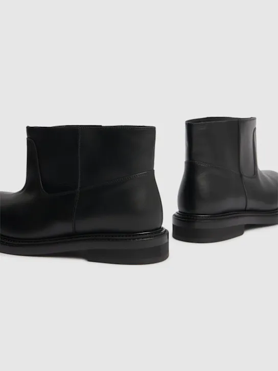 Moschino   40mm Leather flared boots 