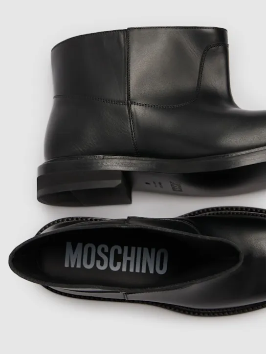 Moschino   40mm Leather flared boots 