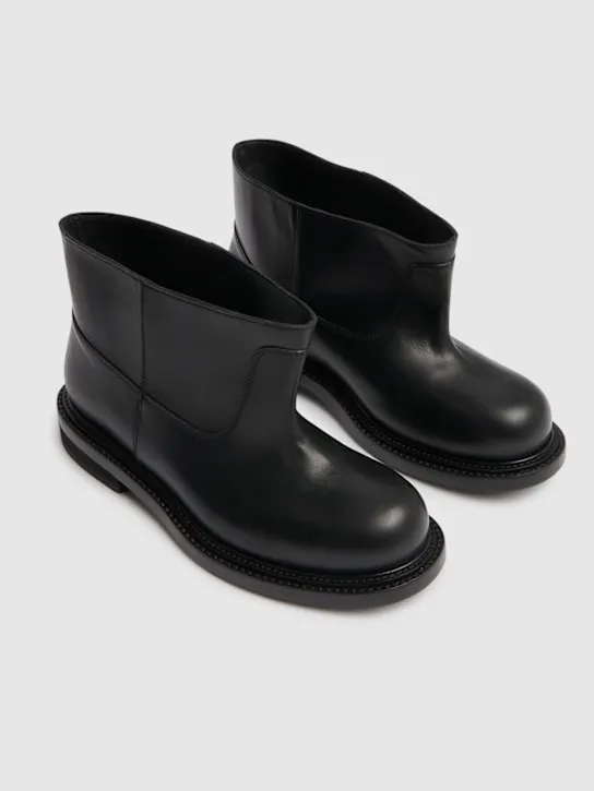 Moschino   40mm Leather flared boots 