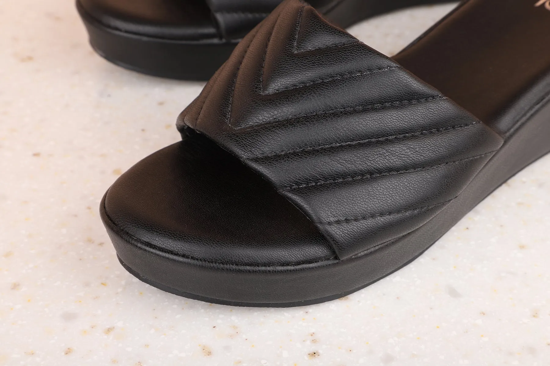 Women Black Textured Wedge Heels
